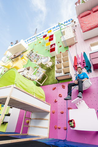 Illustration for article titled Test Your Endurance on This Ikea Showroom-Turned-Climbing Wall